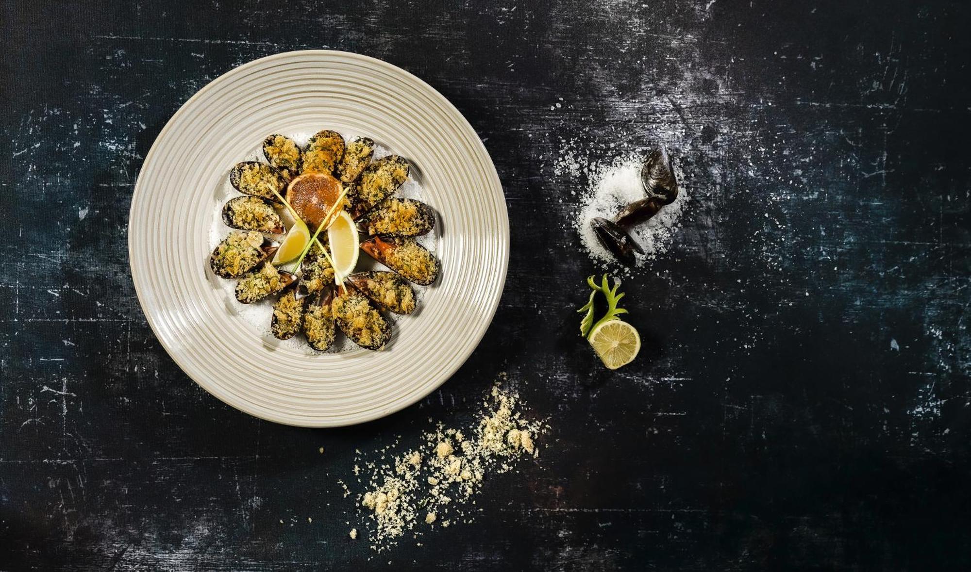 Moevenpick Resort & Marine Spa Sousse Exterior photo A plate of grilled scallops