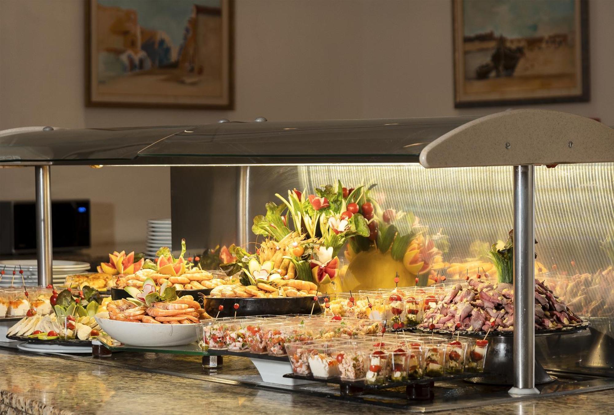 Moevenpick Resort & Marine Spa Sousse Exterior photo A buffet