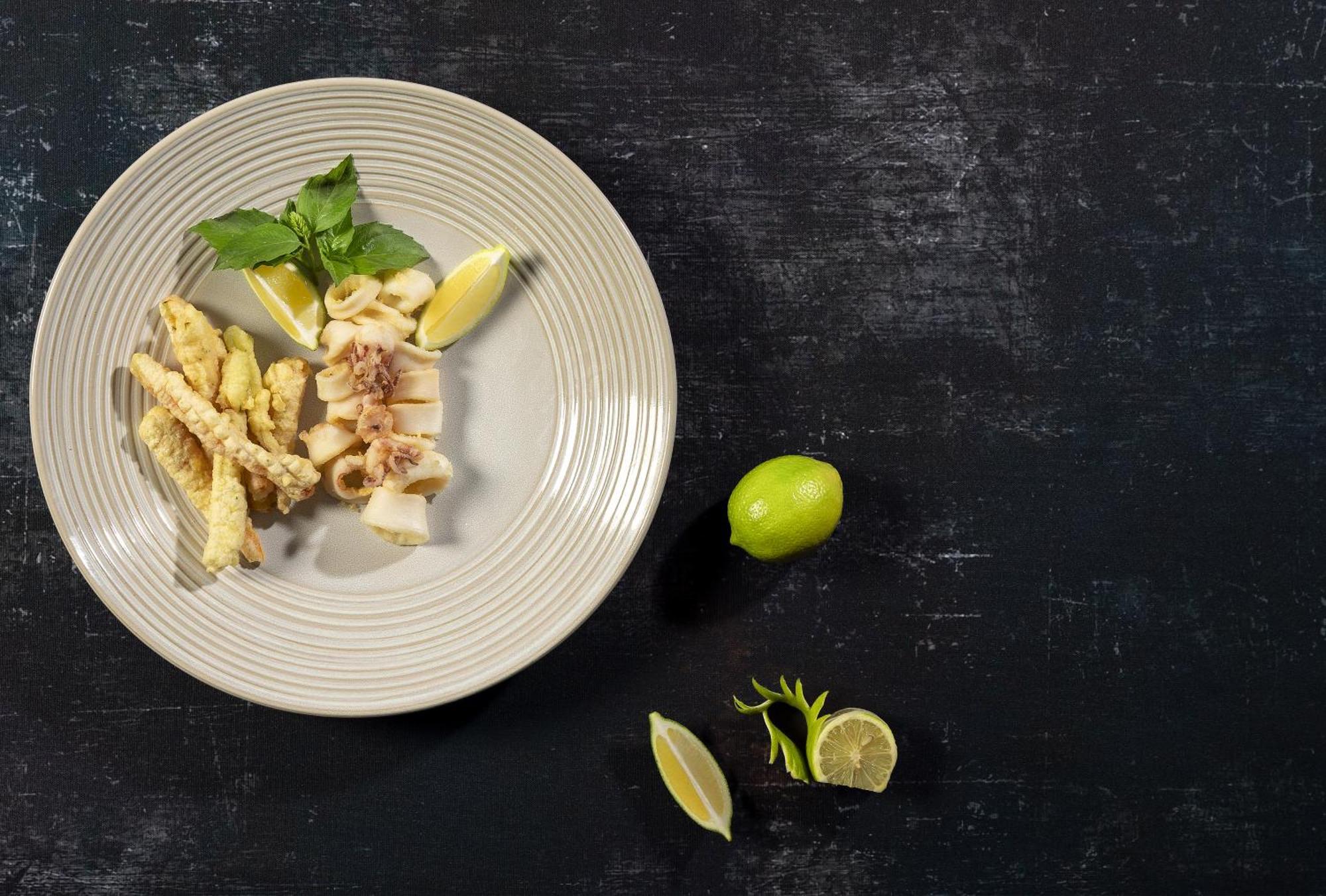 Moevenpick Resort & Marine Spa Sousse Exterior photo A plate of raw cuttlefish